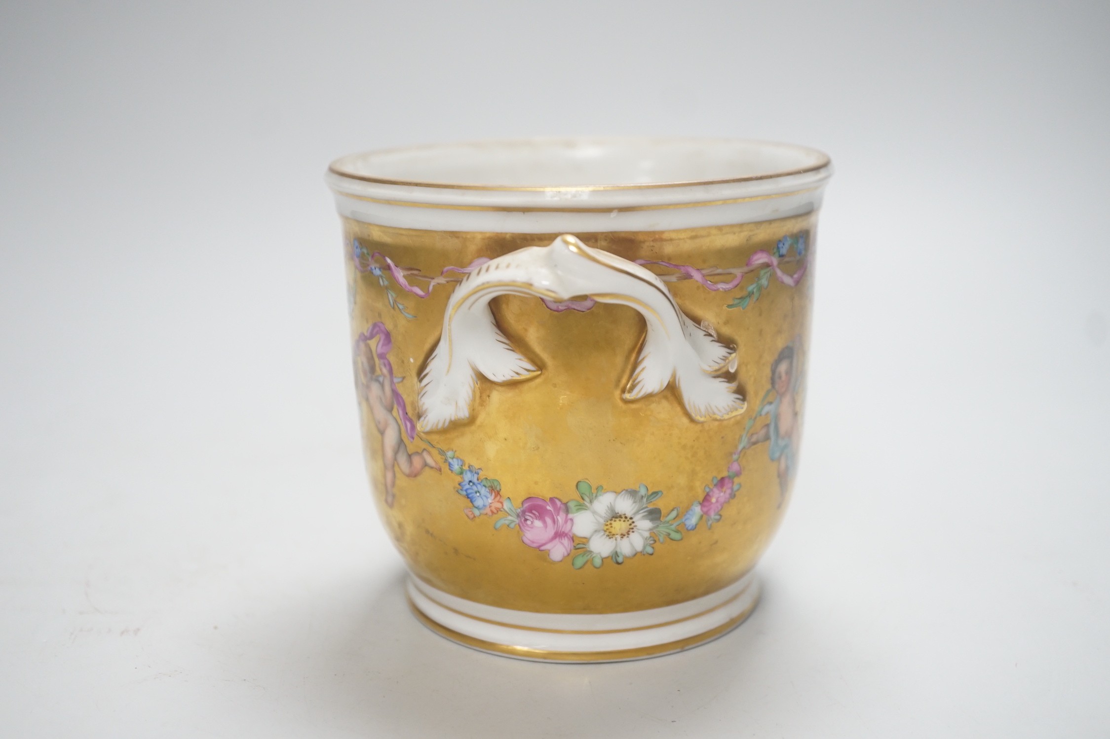 A late 19th century gilded Dresden cherubic jardiniere, 11cm
